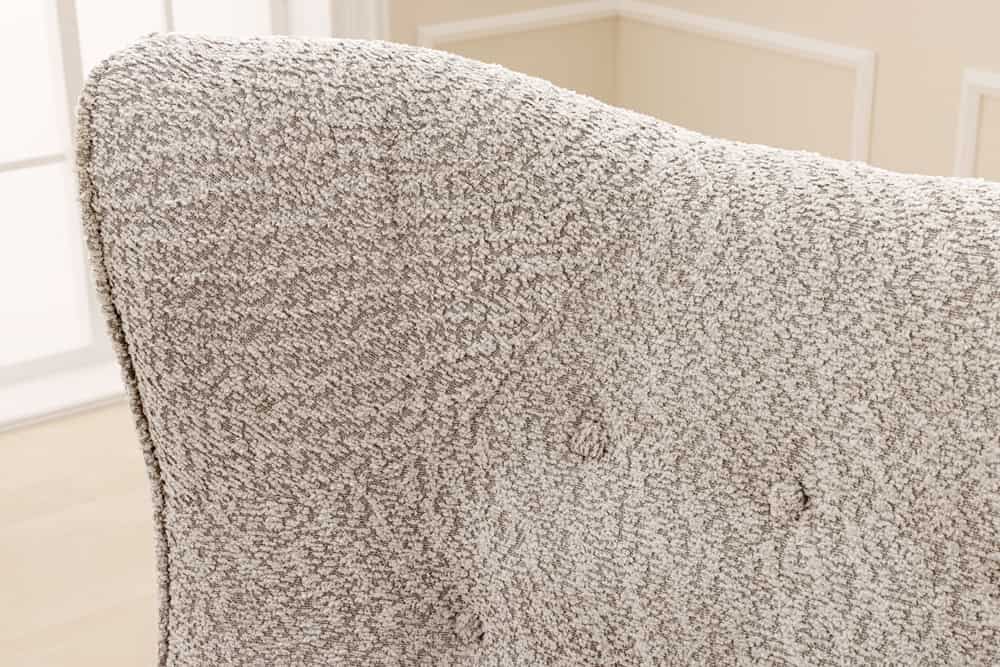 Ohrensessel AMSTERDAM Bouclé Greige mit schwarzen Metallbeinen