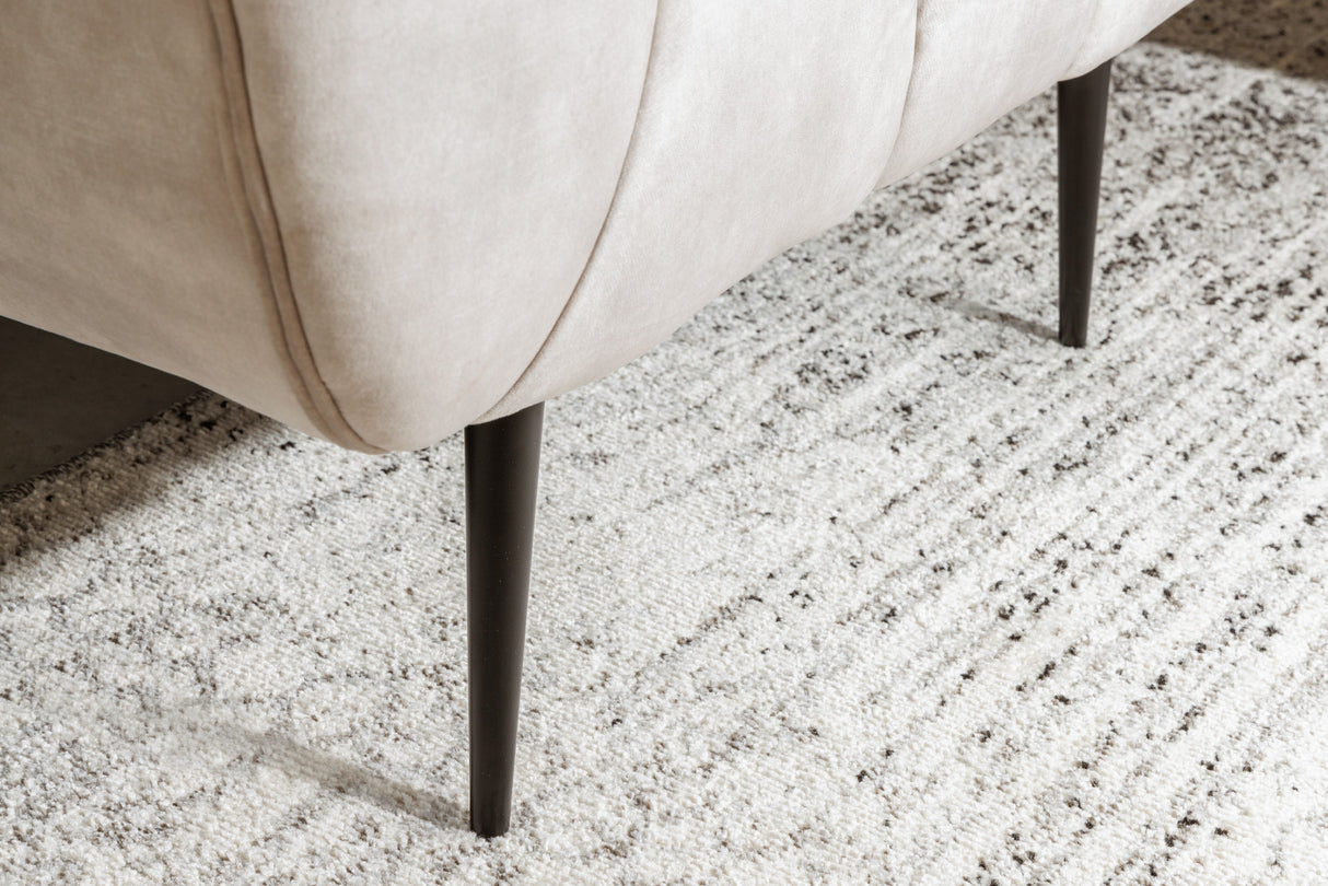 Sessel NOBLESSE Struktursamt Champagner mit schwarzen Füßen