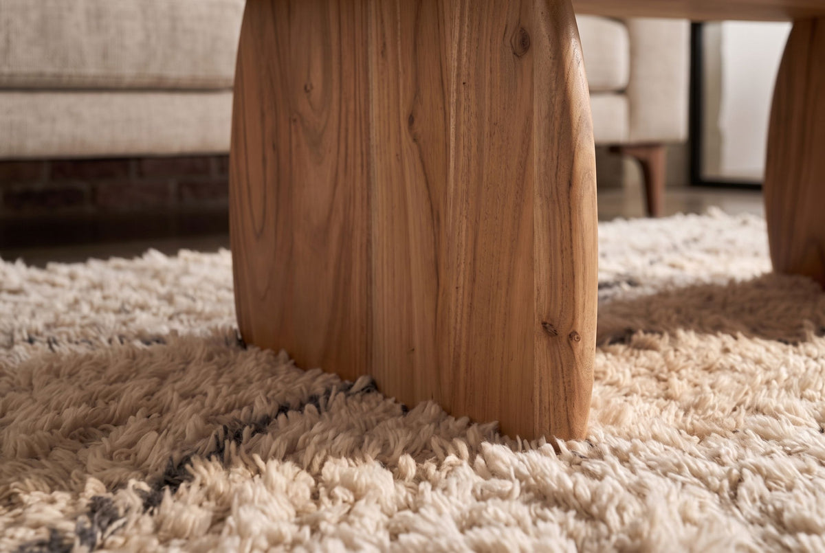 Couchtisch SCULPTURA 110cm skulpturale Form Akazienholz natur