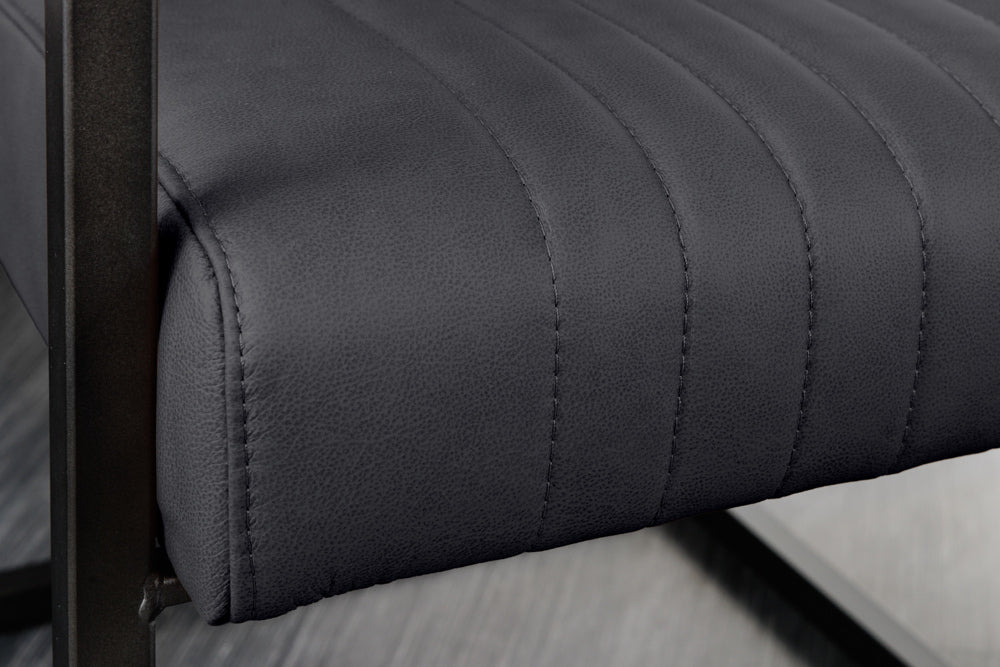 Freischwinger Stuhl BIG ASTON mit Armlehnen Federkern schwarz Metallbeine Leder schwarz