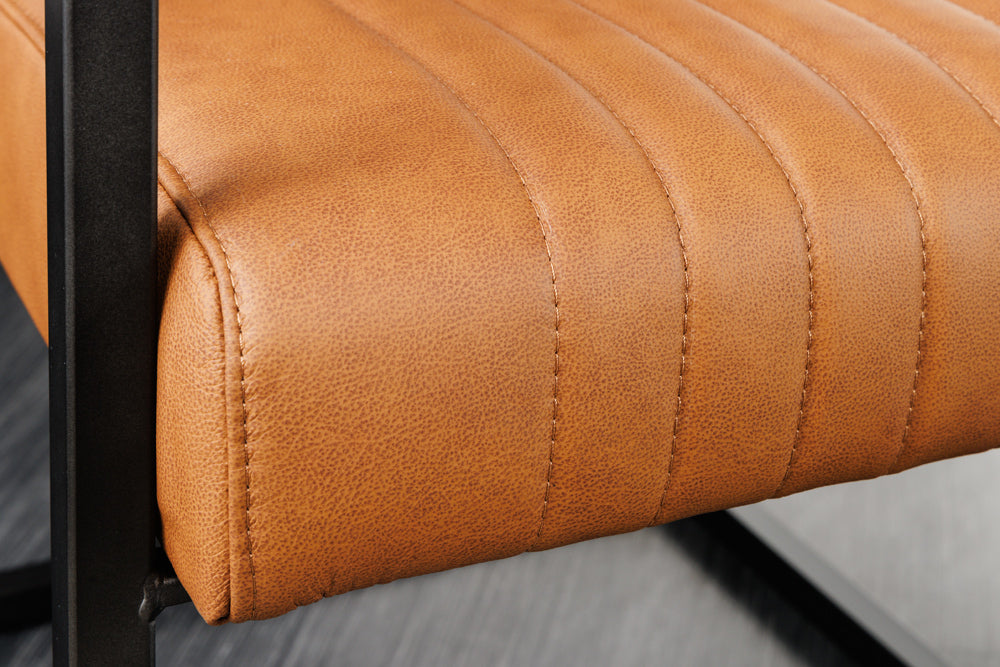 Freischwinger Stuhl BIG ASTON mit Armlehnen Federkern schwarz Metallbeine Leder Vintage Cognac