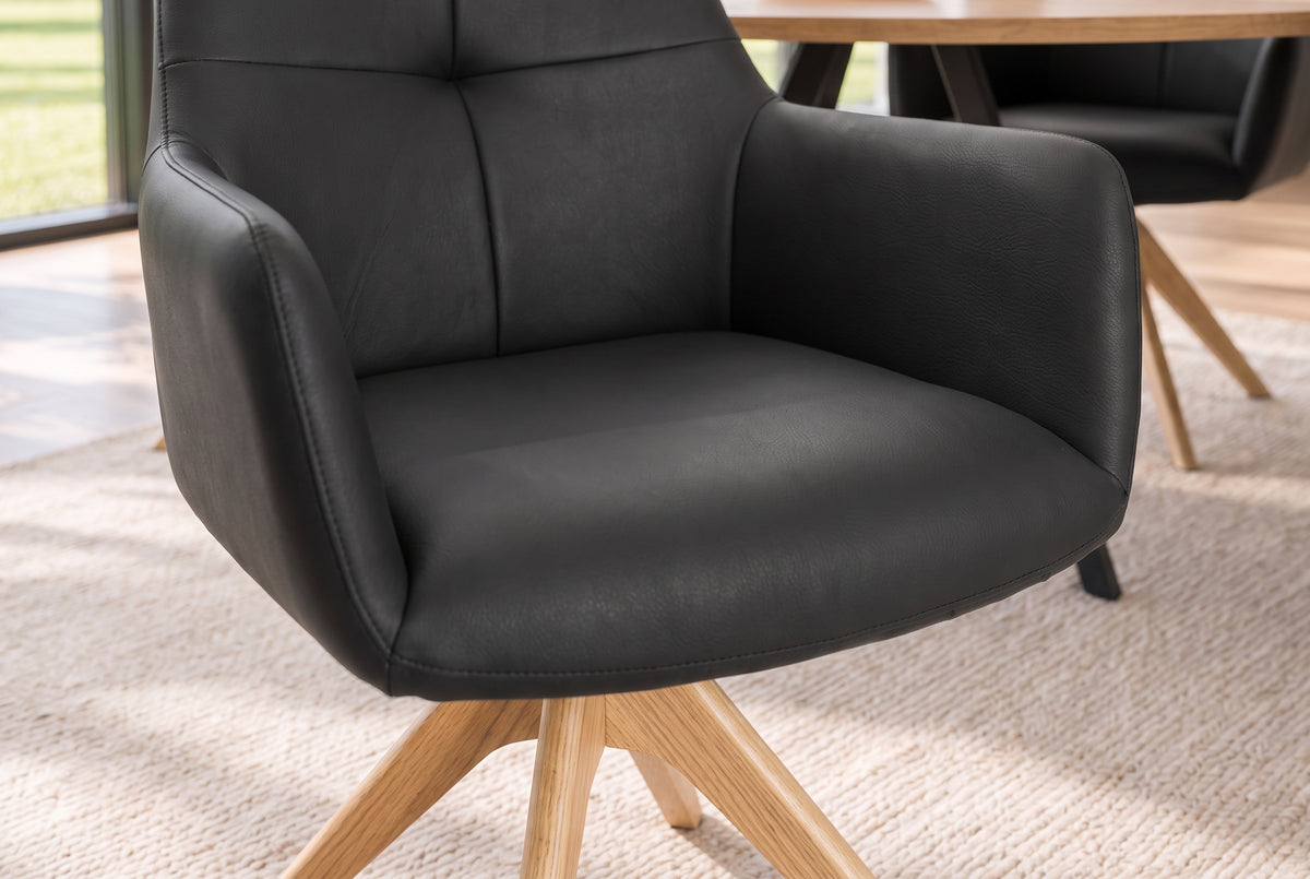 Swivel chair ALMARA 360° auto-return w/ armrests pocket spring core leather black