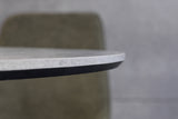 Esstisch ATELIER 100cm rund, graue Steinoptik mit schwarzen Metallbeinen