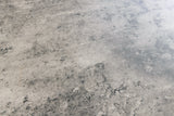 Esstisch ATELIER 120cm rund, graue Steinoptik mit schwarzen Metallbeinen