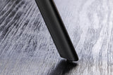 Esstisch ATELIER 100cm rund, graue Steinoptik mit schwarzen Metallbeinen