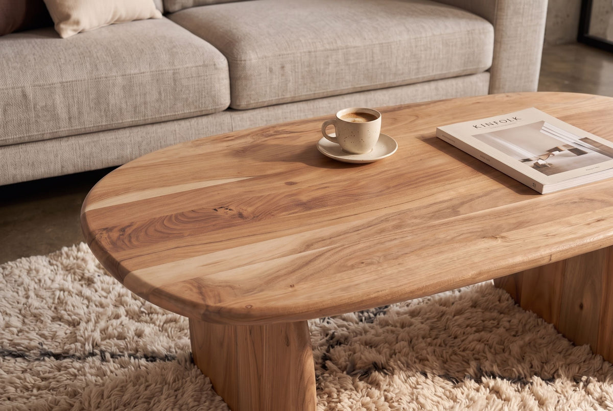Couchtisch SCULPTURA 110cm skulpturale Form Akazienholz natur